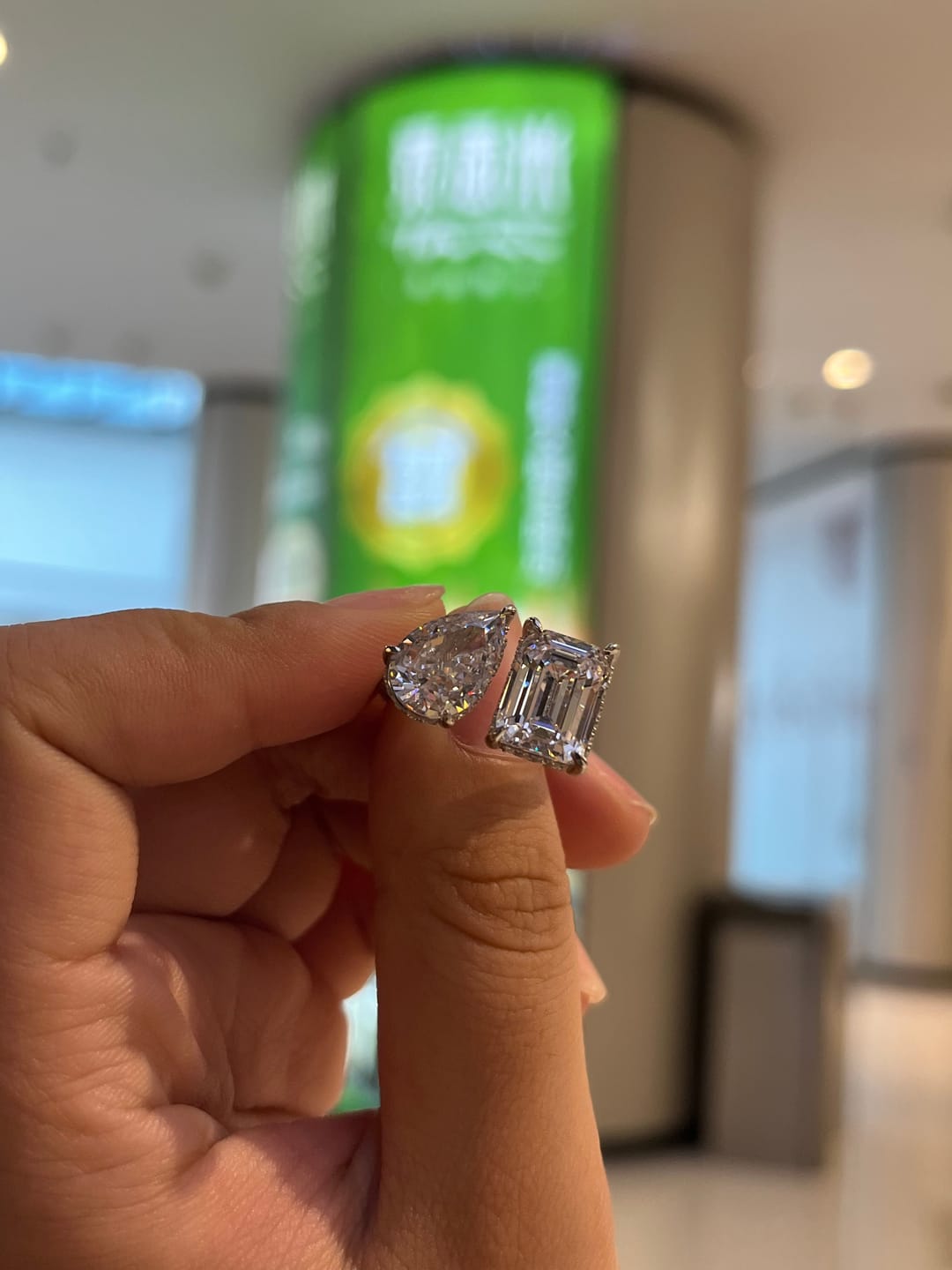 Customer photo review of Louily Unique Double Stones Design Emerald Cut & Pear Cut Engagement Ring