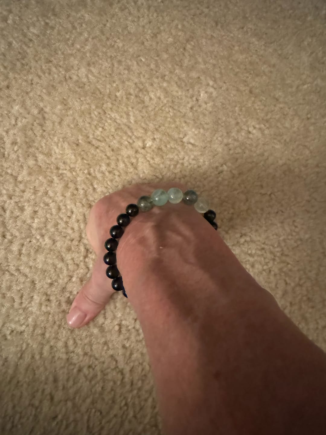 Customer photo review of Jasper and Onyx Bracelet against Negativity