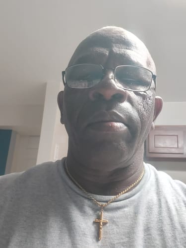 Customer photo review of Crucifix Pendant | Gold