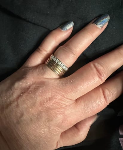Customer photo review of Channel Set Moissanite Half Eternity Wedding Band Ring In Sterling Silver