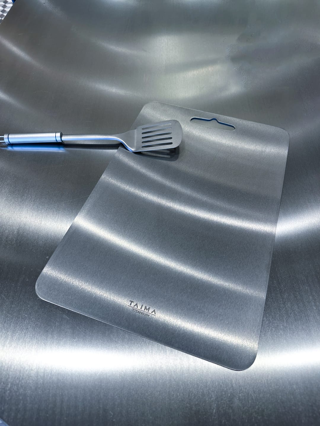 Customer photo review of Original Taima™ 100% Pure Titanium Cutting Board (SALES P)