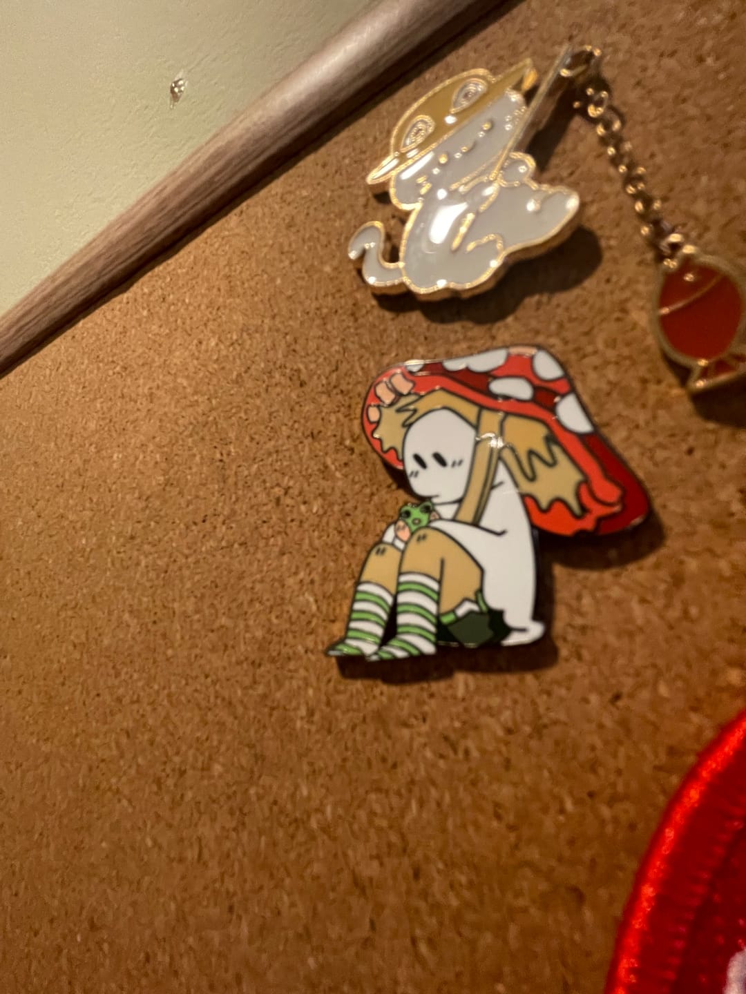 Customer photo review of Red Mushroom Ghost Enamel Pin