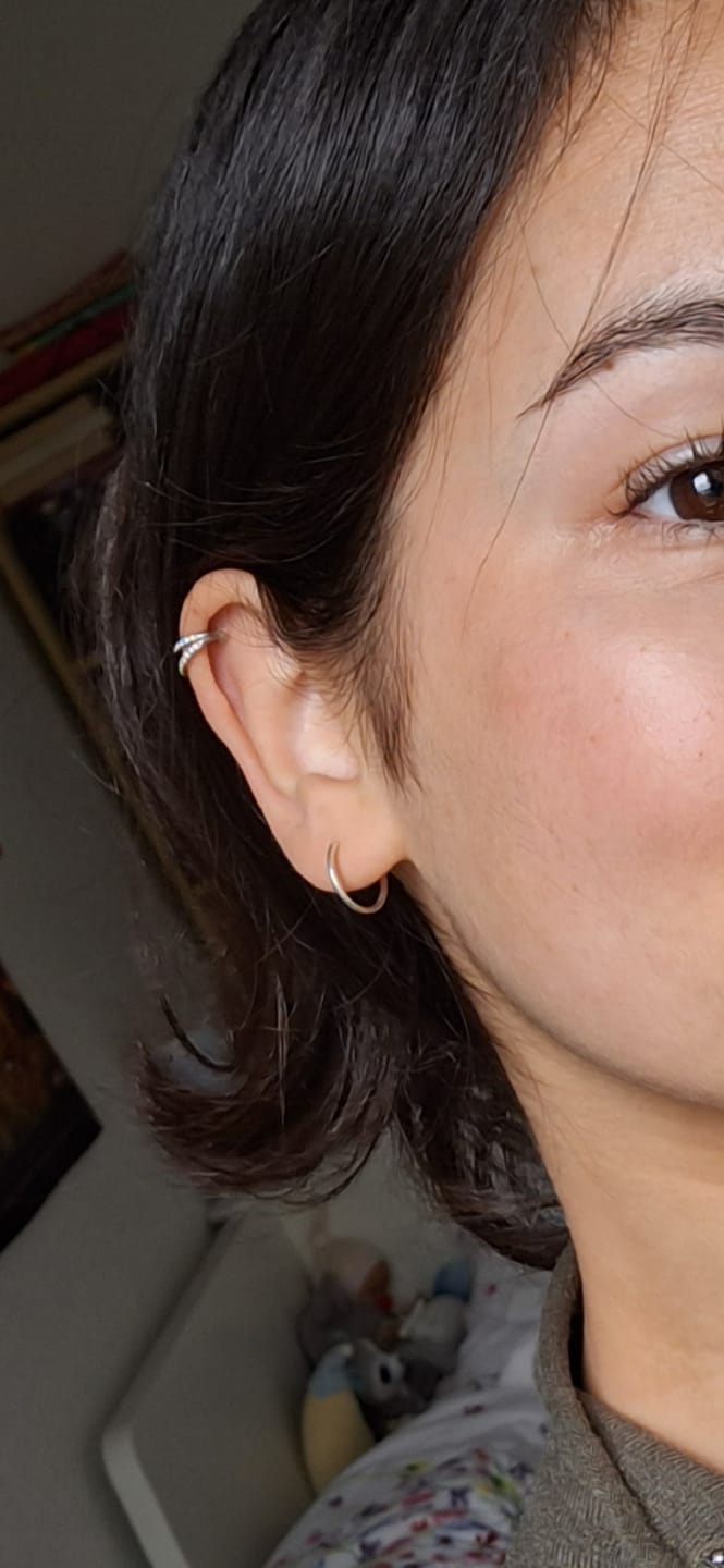 Customer photo review of Double Clicker Piercing | Titan