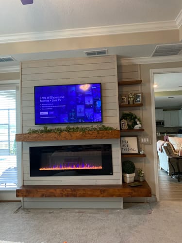 Customer photo review of Touchstone Sideline 60” Wall-Mount / Recessed Electric Fireplace
