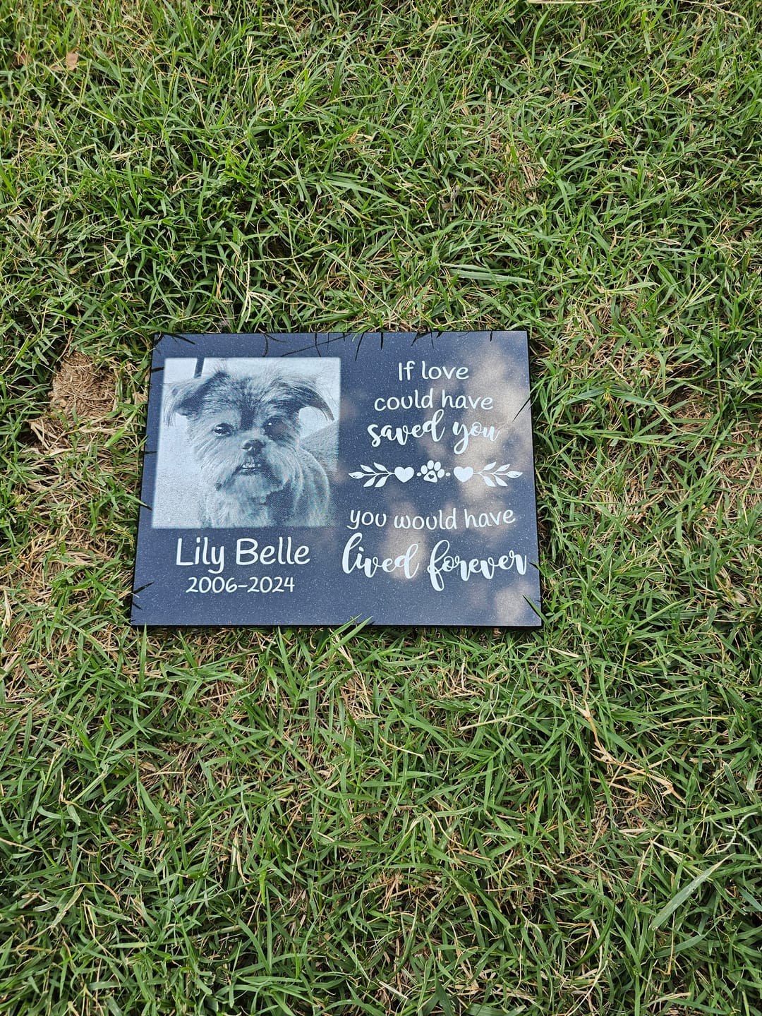 Customer photo review of Outdoor Personalized Dog Memorial Plaque Black Granite keepsake stone