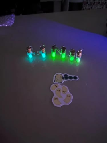 Customer photo review of Ghost in the Bottle Glow in the Dark Earrings