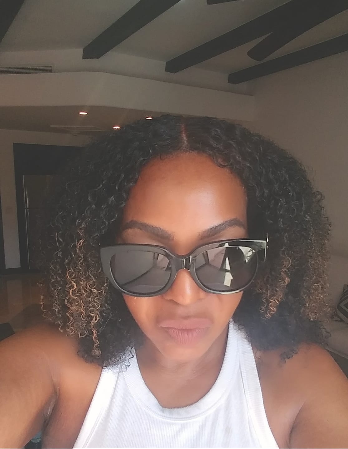 Customer photo review of Teni  - Brazilian Multi-Texture Curly 5X5 Lace Closure Wig
