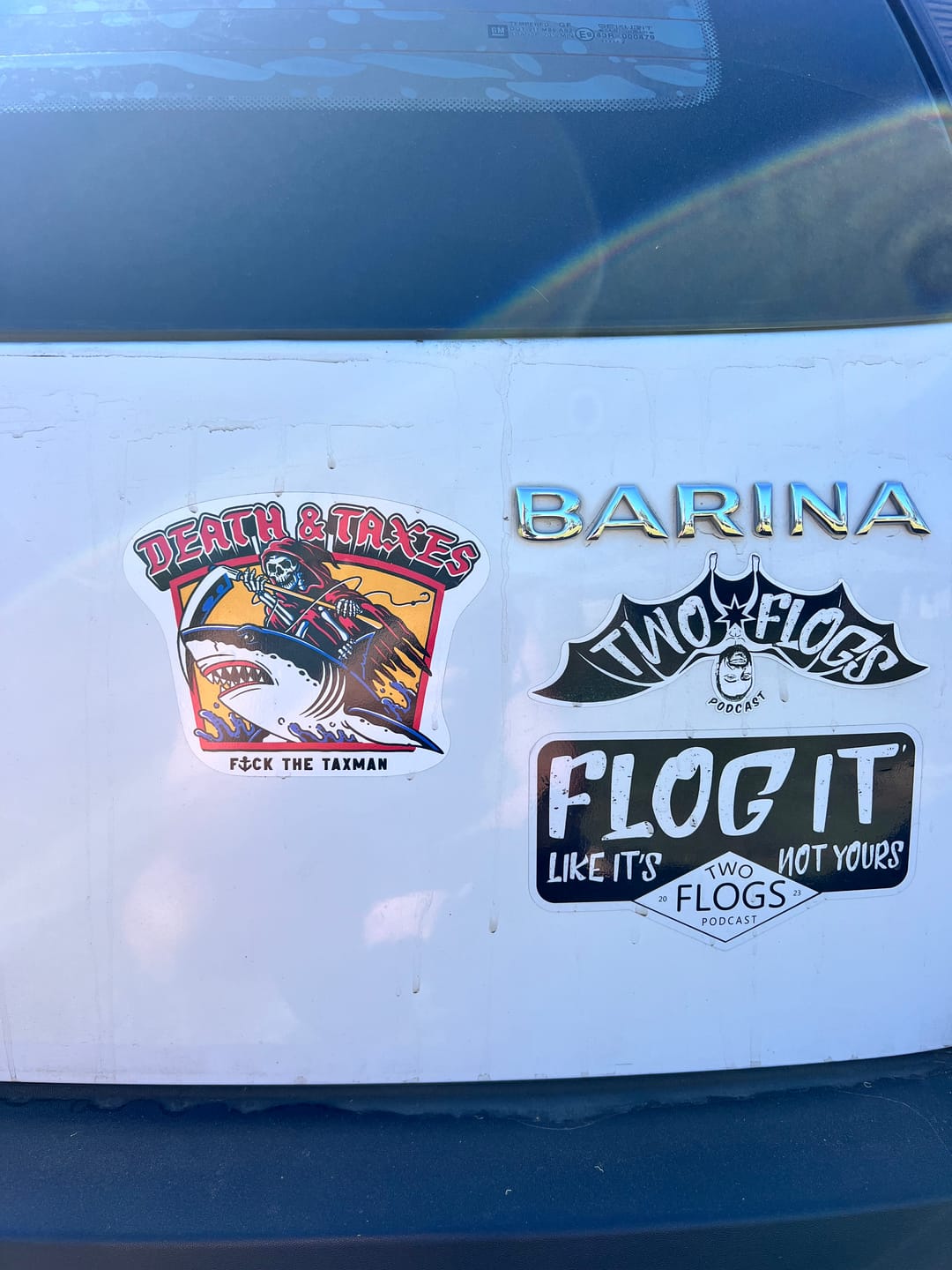 Customer photo review of Death & Taxes Sticker