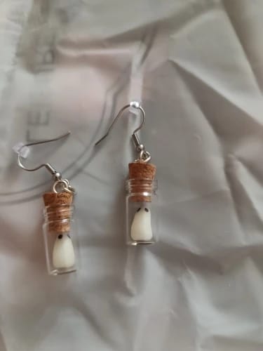 Customer photo review of Ghost in the Bottle Glow in the Dark Earrings