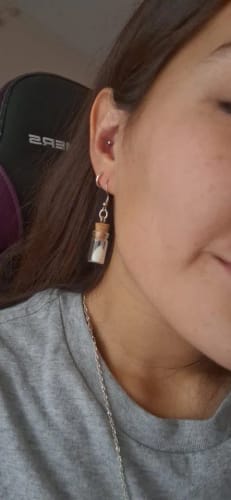 Customer photo review of Ghost in the Bottle Glow in the Dark Earrings