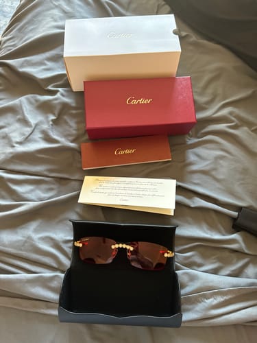 Customer photo review of Iced out Rimless Sunglasses Detroit style Buffs