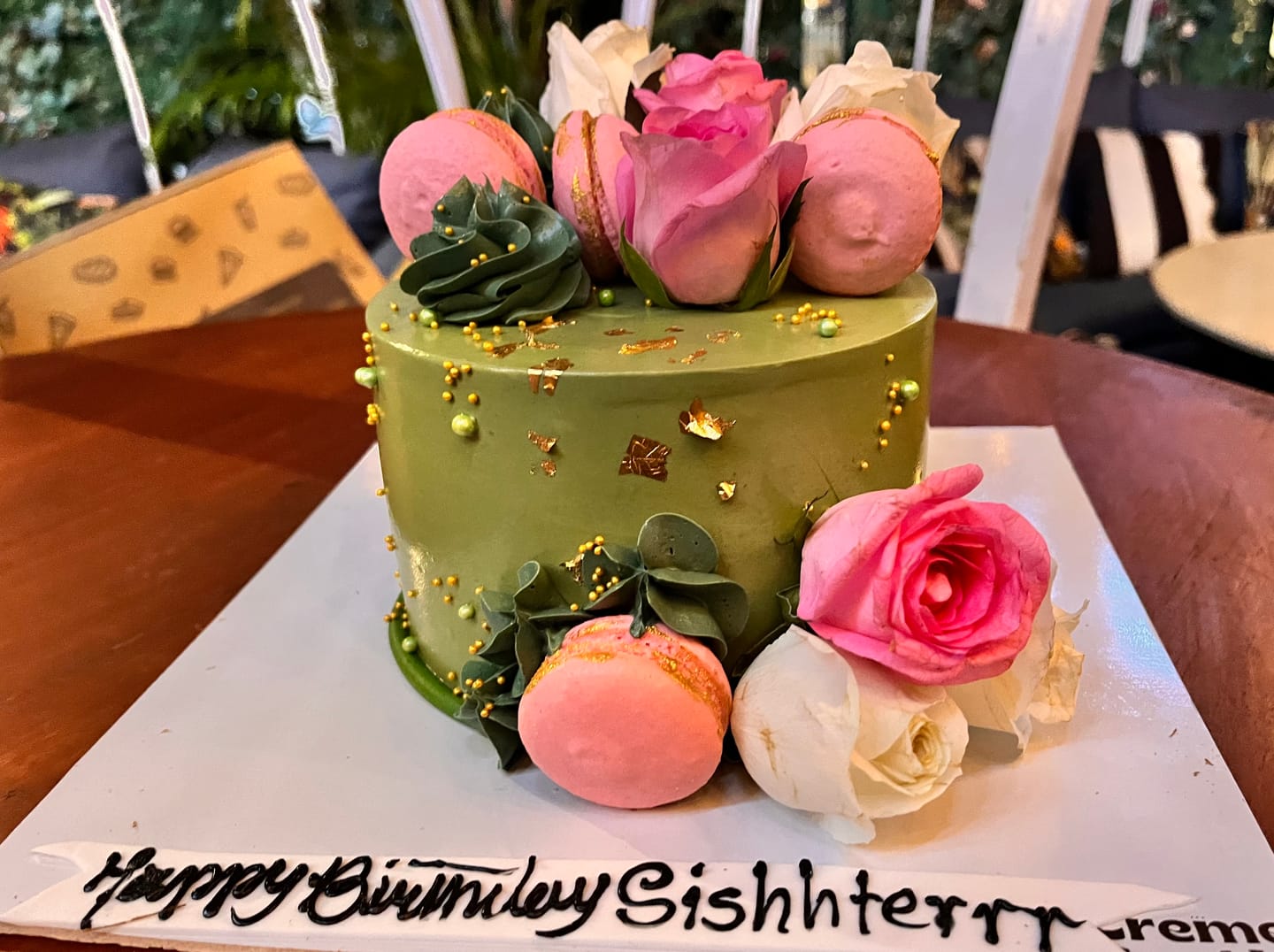 Customer photo review of Bottle Green Floral Cake
