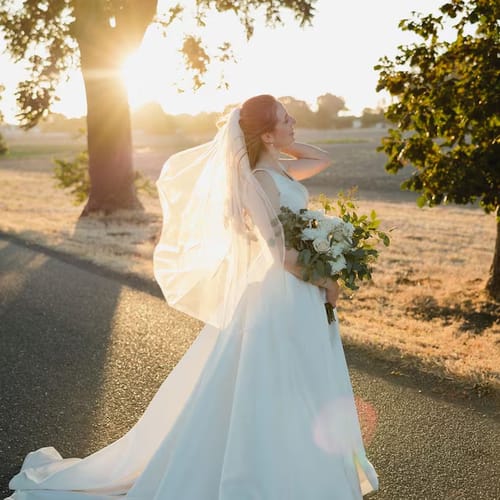 Customer photo review of Single Tier Pencil Edge Veil: Fingertip, Chapel & Cathedral Length - BRIA