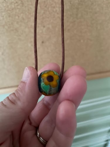 Customer photo review of Glass Sunflower Bead with Infused Cremains