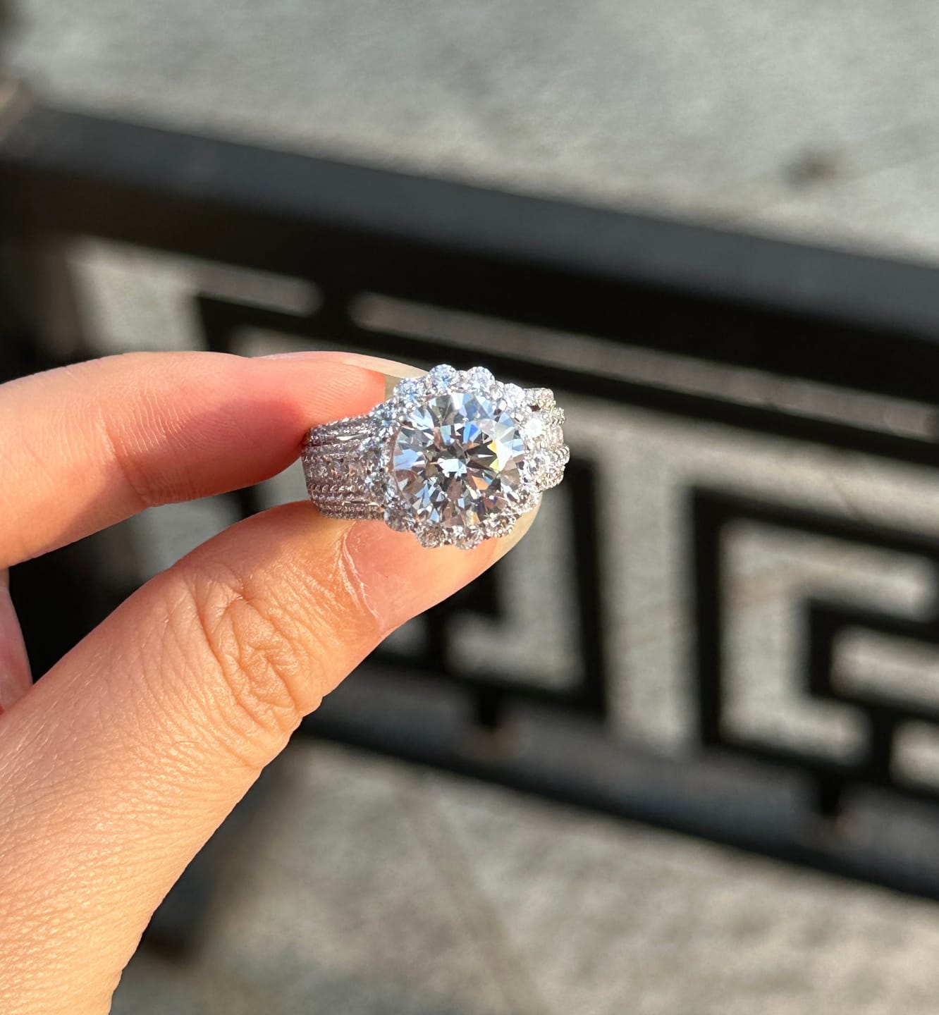 Customer photo review of Louily Unique Halo Design Round Cut Engagement Ring In Sterling Silver