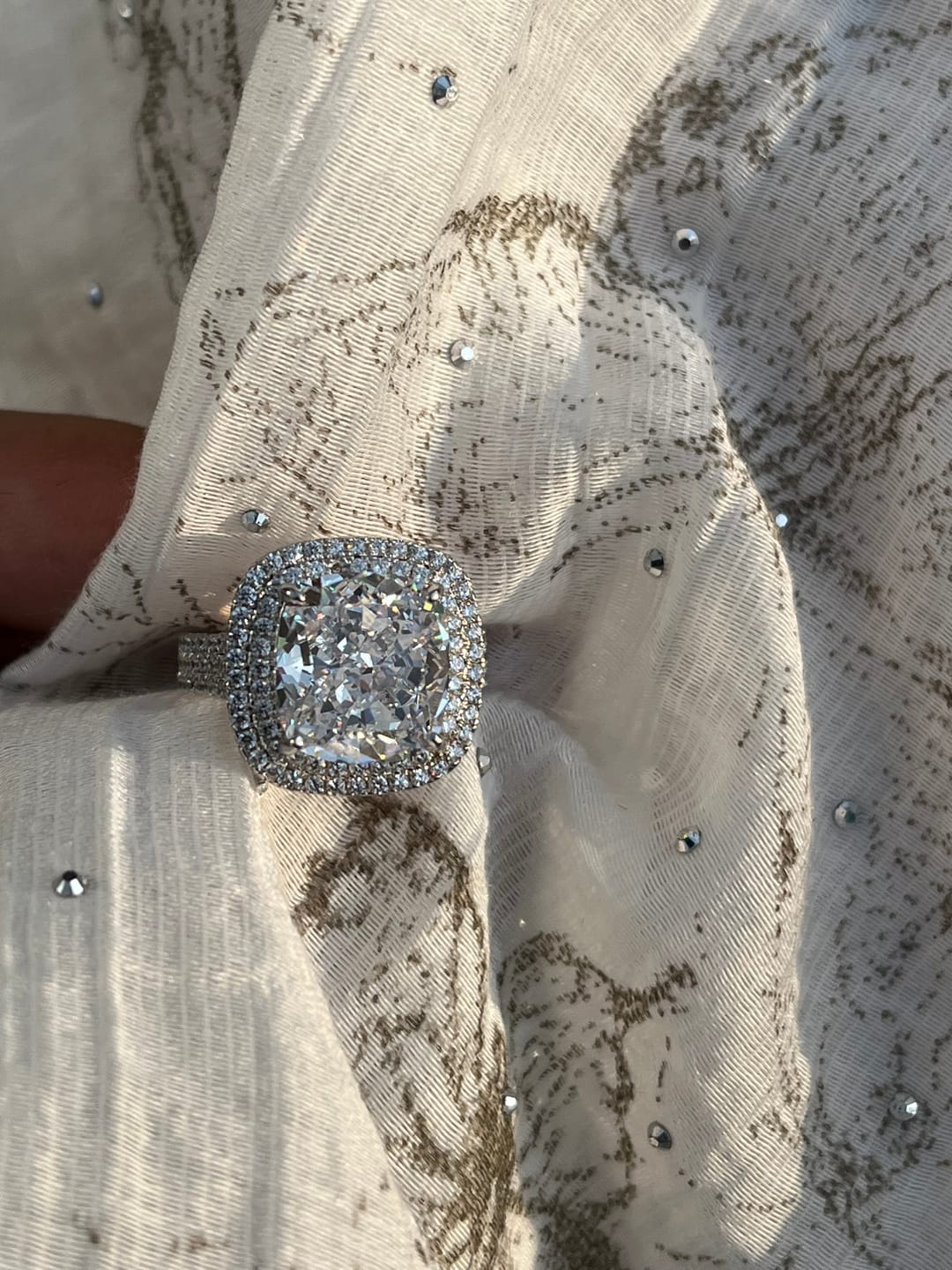 Customer photo review of Louily Luxury Double Halo Three Shank Cushion Cut Engagement Ring