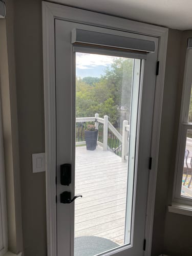 Customer photo review of SmartWings Motorized Roller Shades 100% Blackout Essential