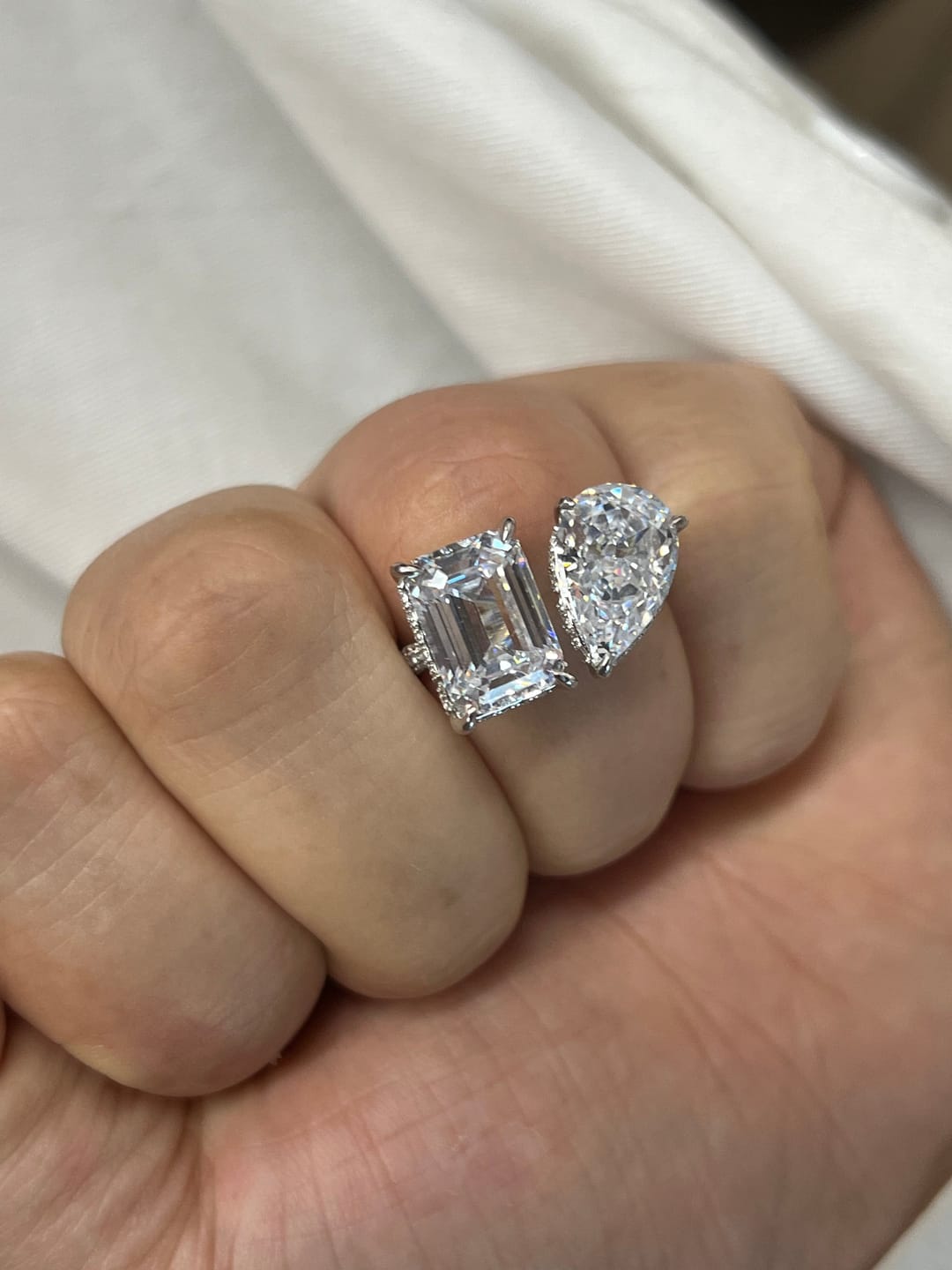 Customer photo review of Louily Unique Double Stones Design Emerald Cut & Pear Cut Engagement Ring
