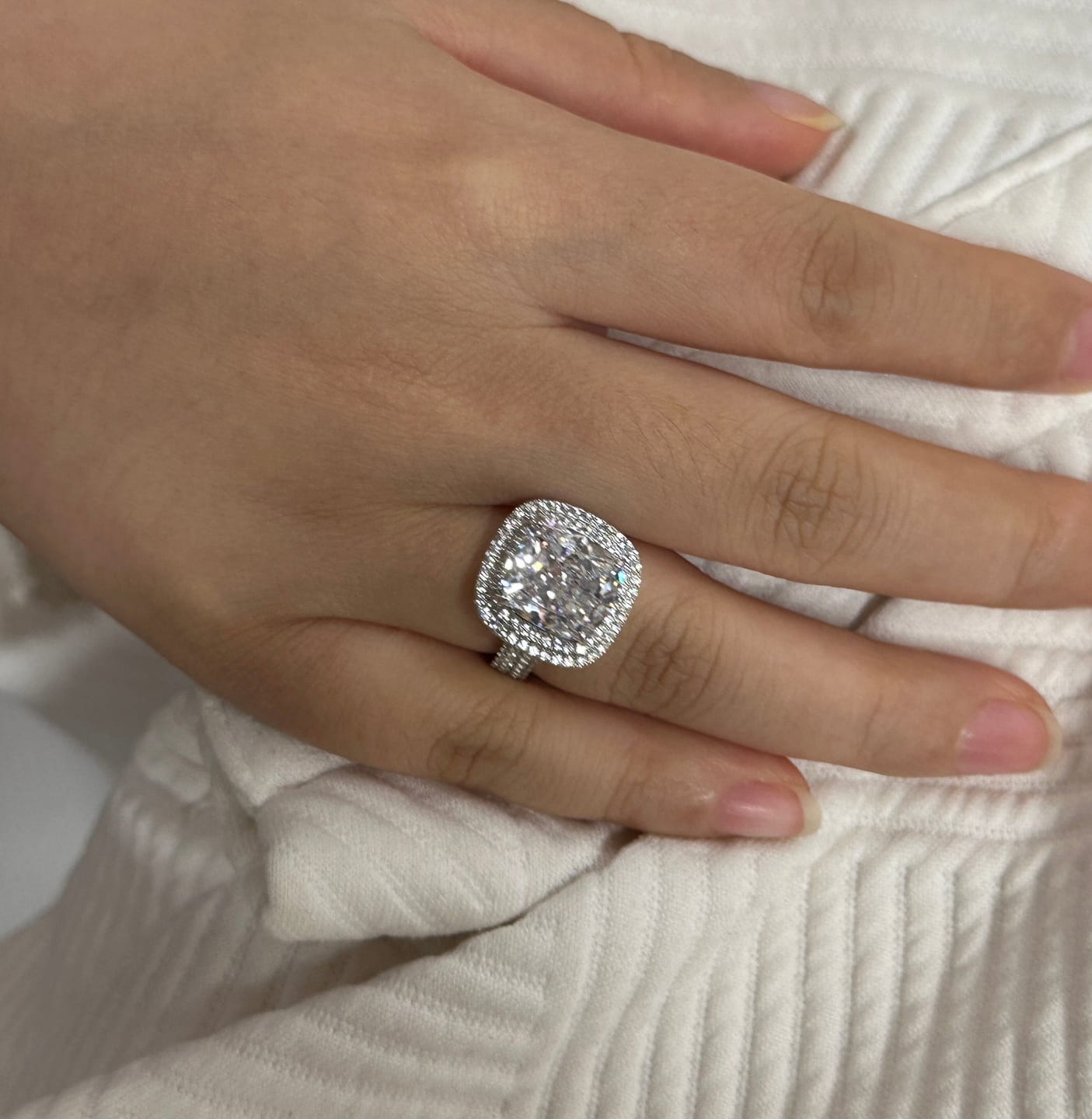 Customer photo review of Louily Luxury Double Halo Three Shank Cushion Cut Engagement Ring