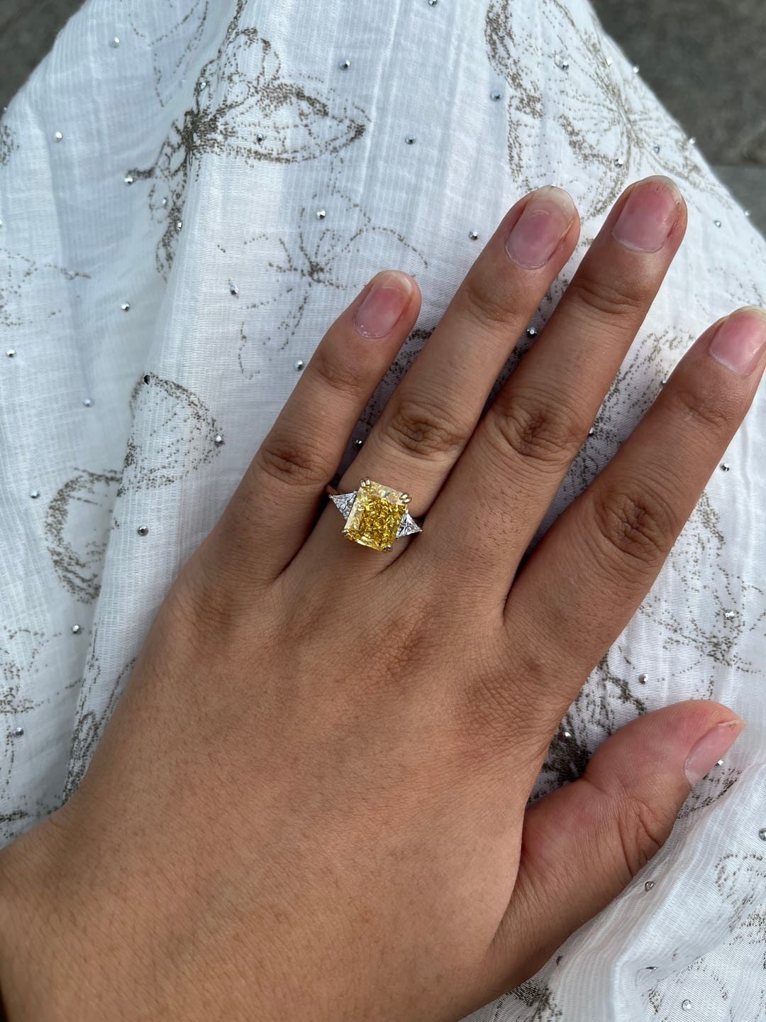 Customer photo review of S925 4.0Ct Radiant & Triangle Cut Yellow Stone Three Stone Engagement Ring In Sterling Silver