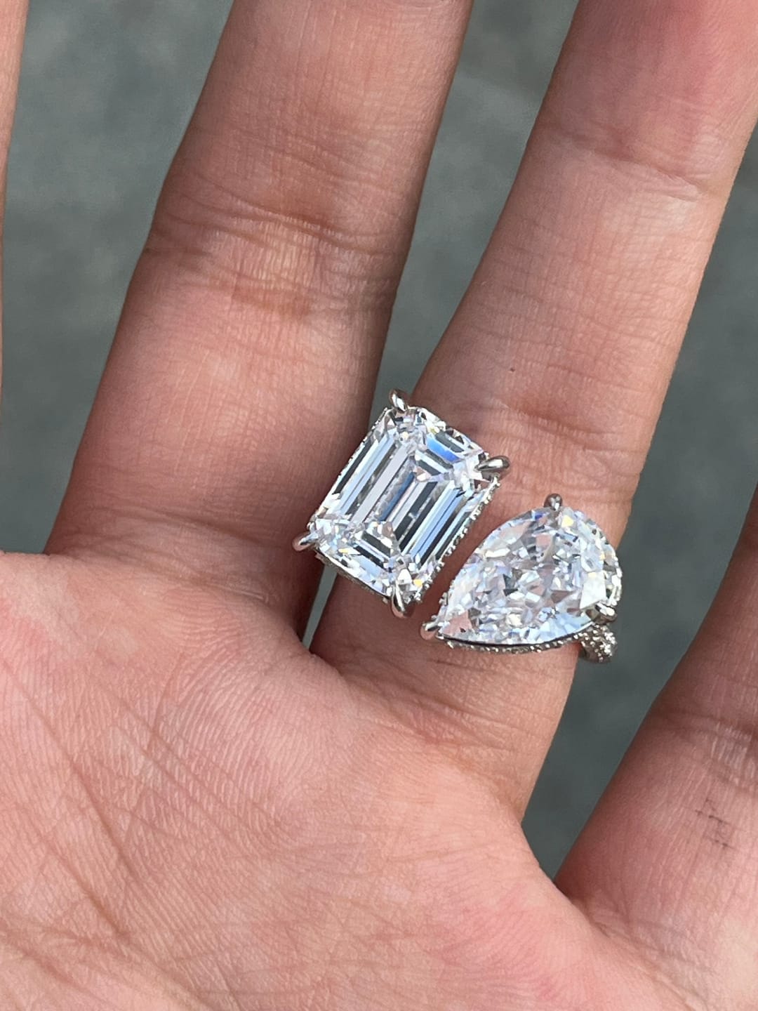 Customer photo review of Louily Unique Double Stones Design Emerald Cut & Pear Cut Engagement Ring