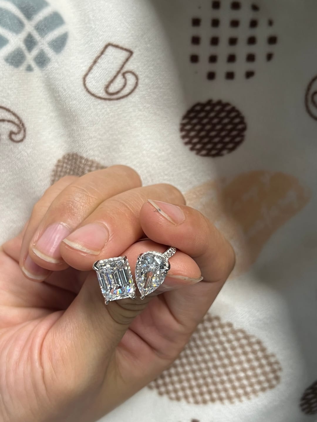 Customer photo review of Louily Unique Double Stones Design Emerald Cut & Pear Cut Engagement Ring