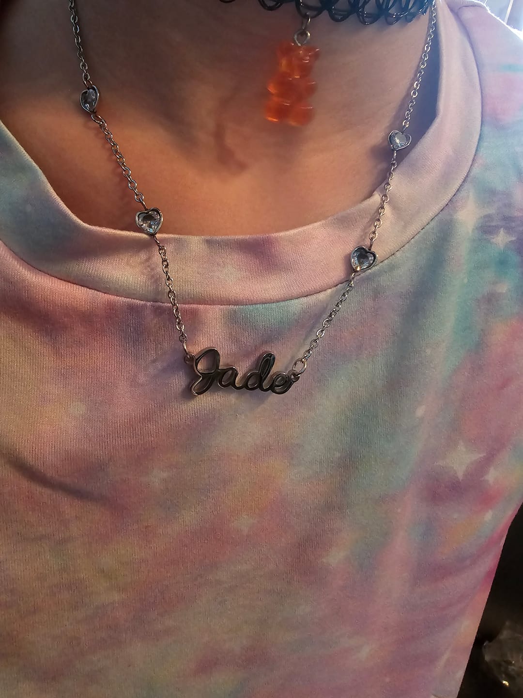 Customer photo review of Collier Cursif avec 4 Coeurs et Pierres