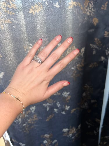 Customer photo review of Red Between The Lines Press On Nails (24PC)