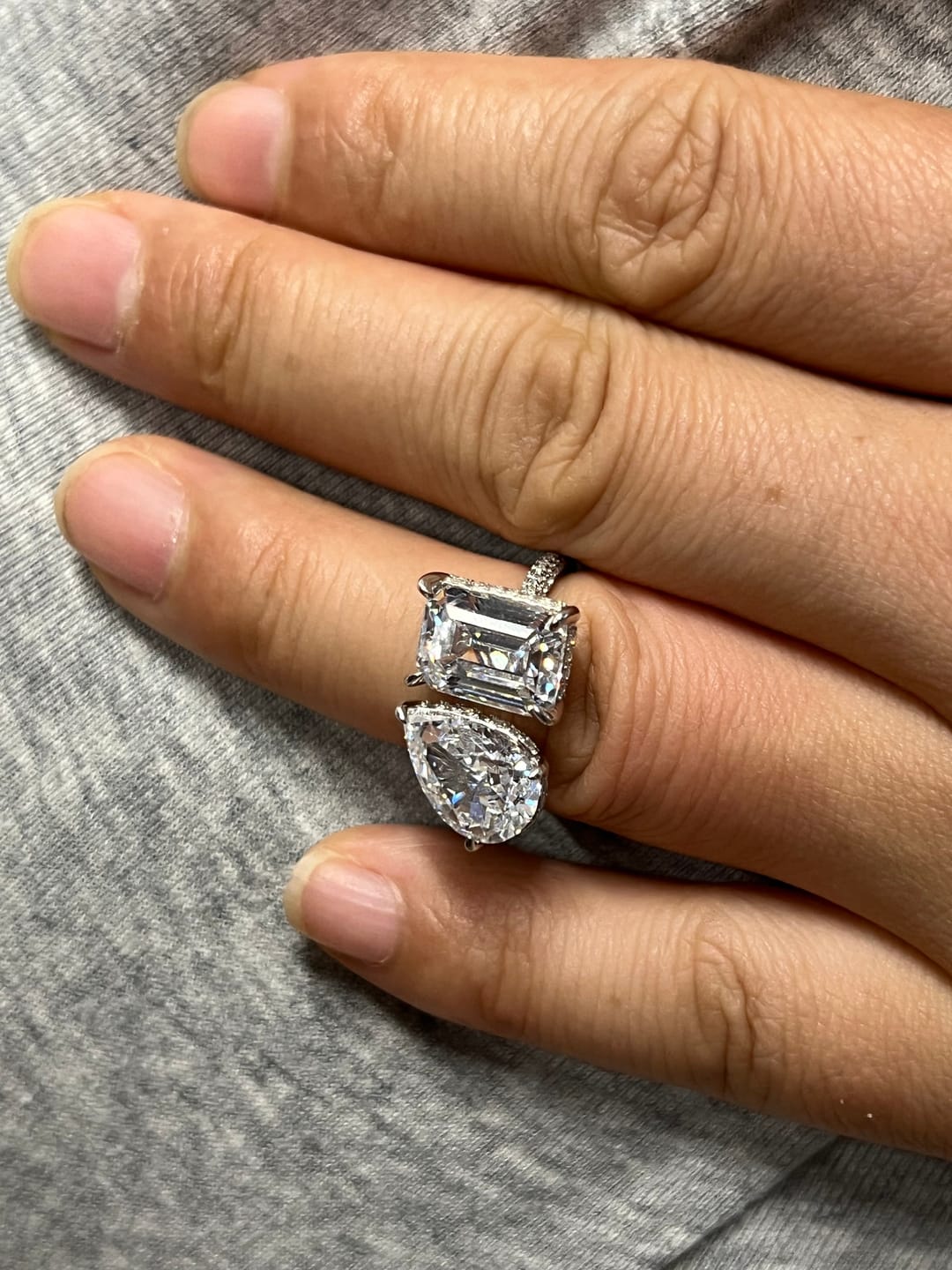 Customer photo review of Louily Unique Double Stones Design Emerald Cut & Pear Cut Engagement Ring