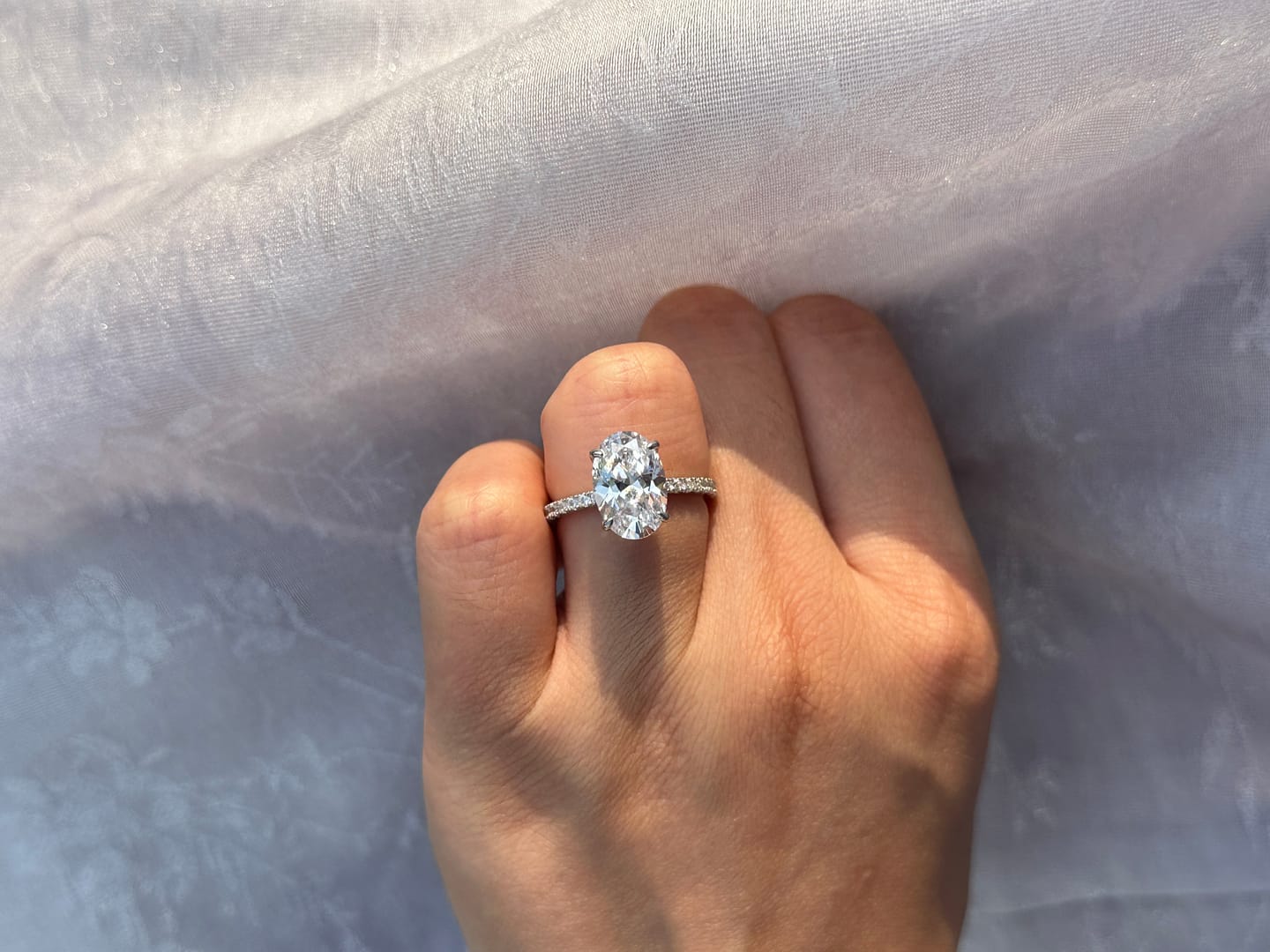 Customer photo review of Louily Halo 3.5Ct Oval Cut Simulated Diamond Engagement Ring In Sterling Silver