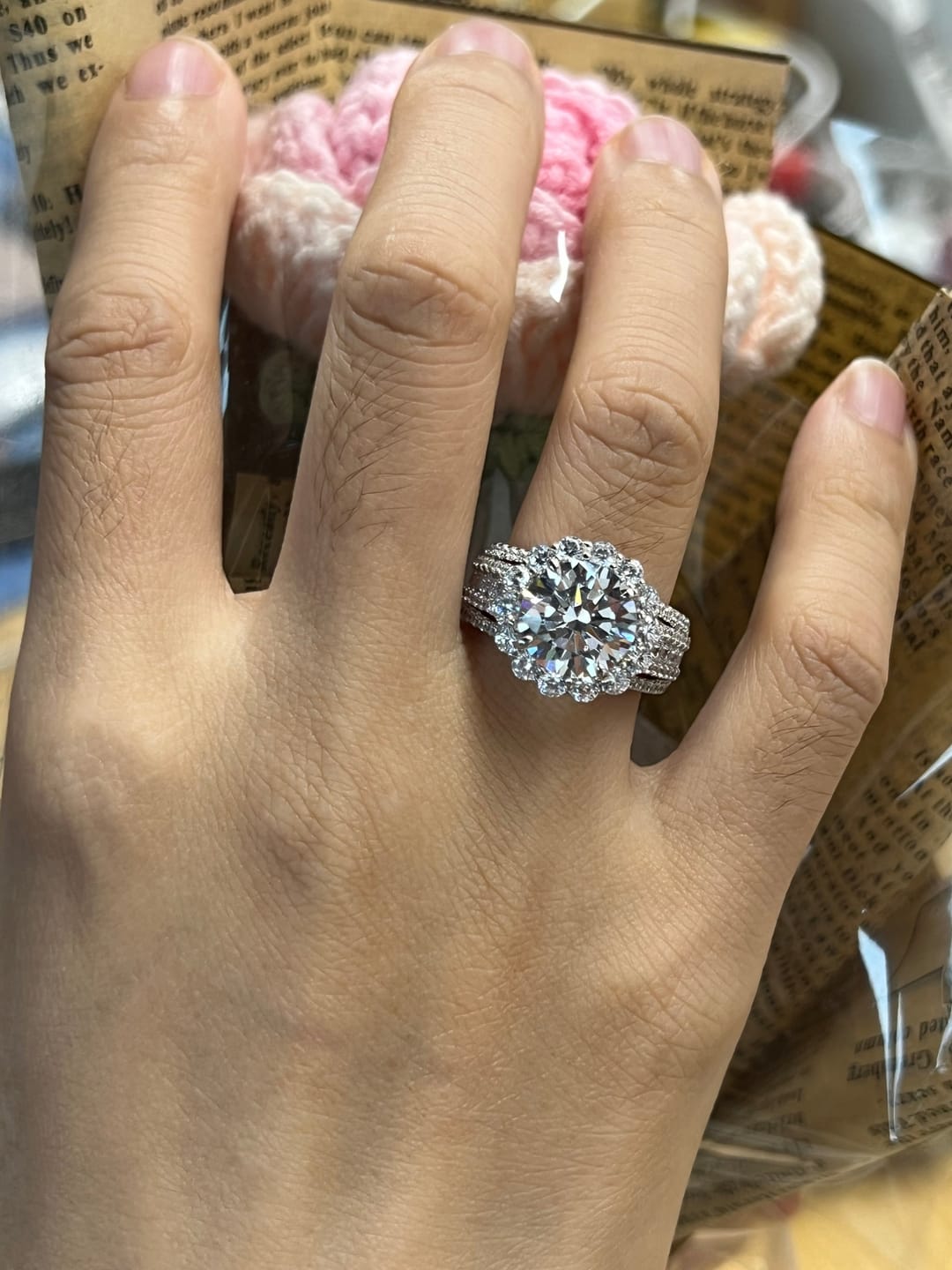 Customer photo review of Louily Unique Halo Design Round Cut Engagement Ring In Sterling Silver