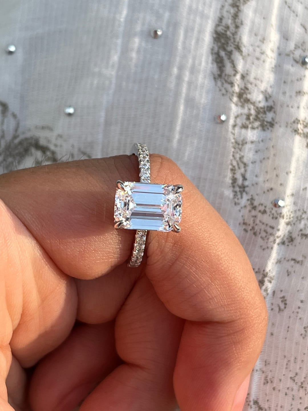 Customer photo review of Louily Classic Emerald Cut Engagement Ring In Sterling Silver