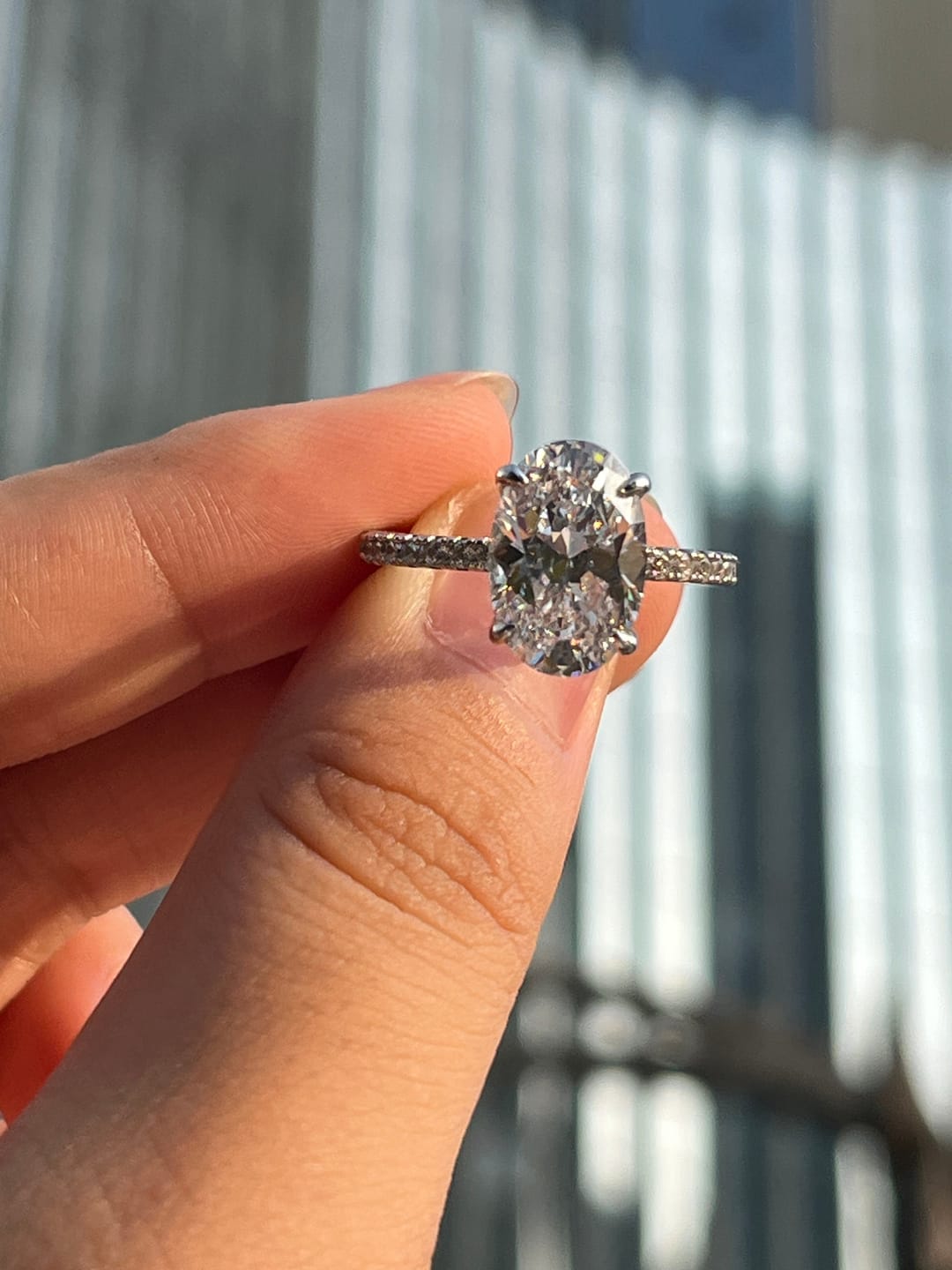 Customer photo review of Louily Halo 3.5Ct Oval Cut Simulated Diamond Engagement Ring In Sterling Silver