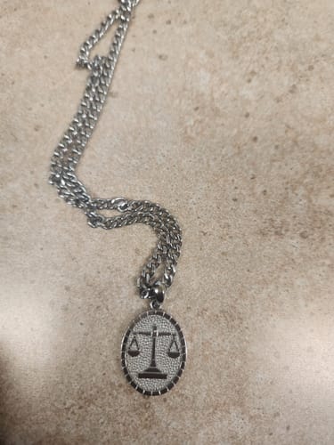 Customer photo review of Oval Zodiac Pendant