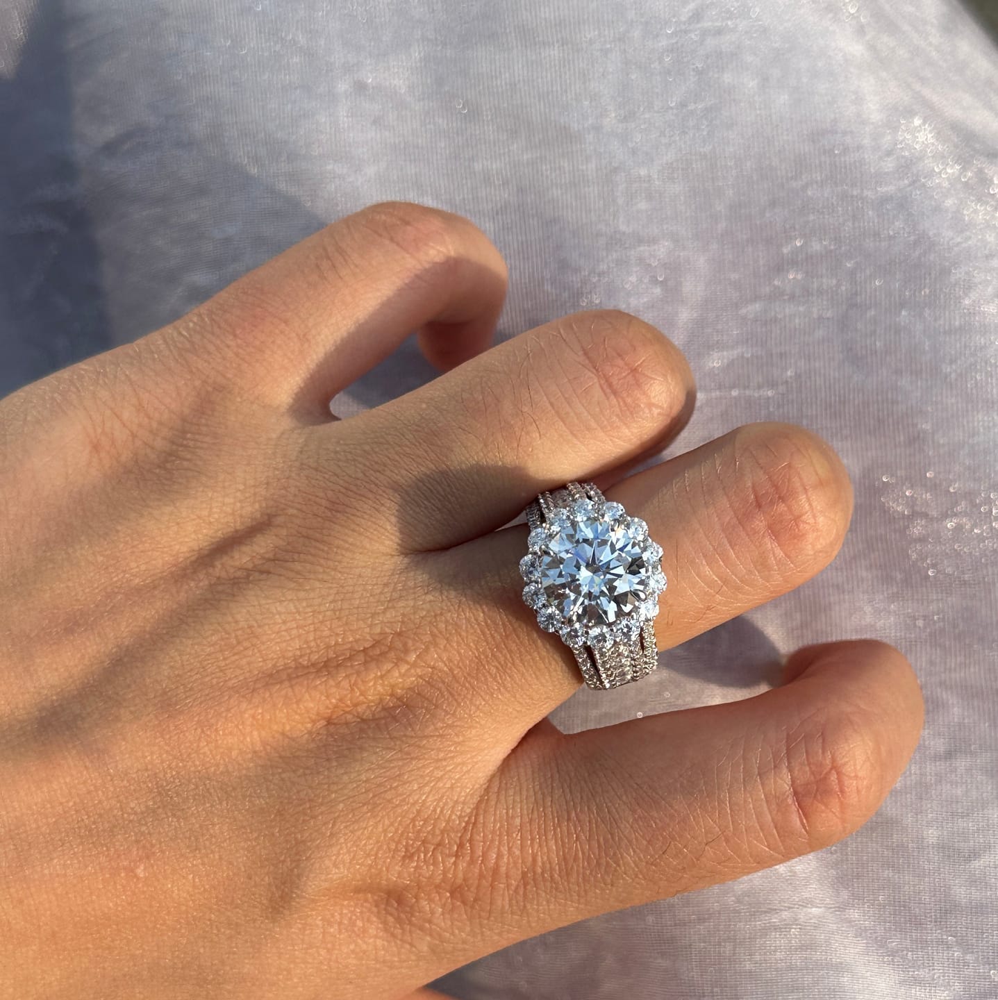 Customer photo review of Louily Unique Halo Design Round Cut Engagement Ring In Sterling Silver