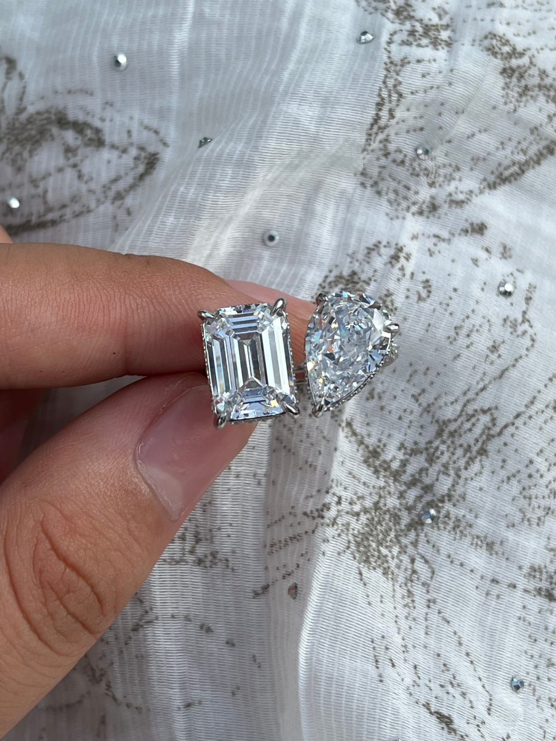 Customer photo review of Louily Unique Double Stones Design Emerald Cut & Pear Cut Engagement Ring