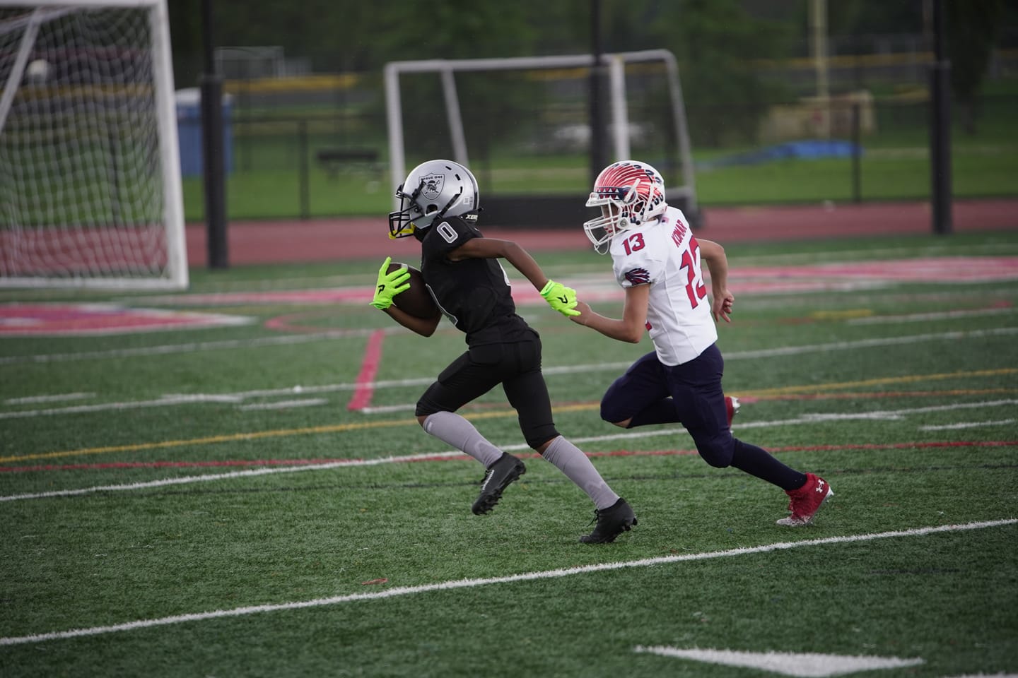 Customer photo review of Phenom Elite VPS5 Youth Football Gloves - Team Colors