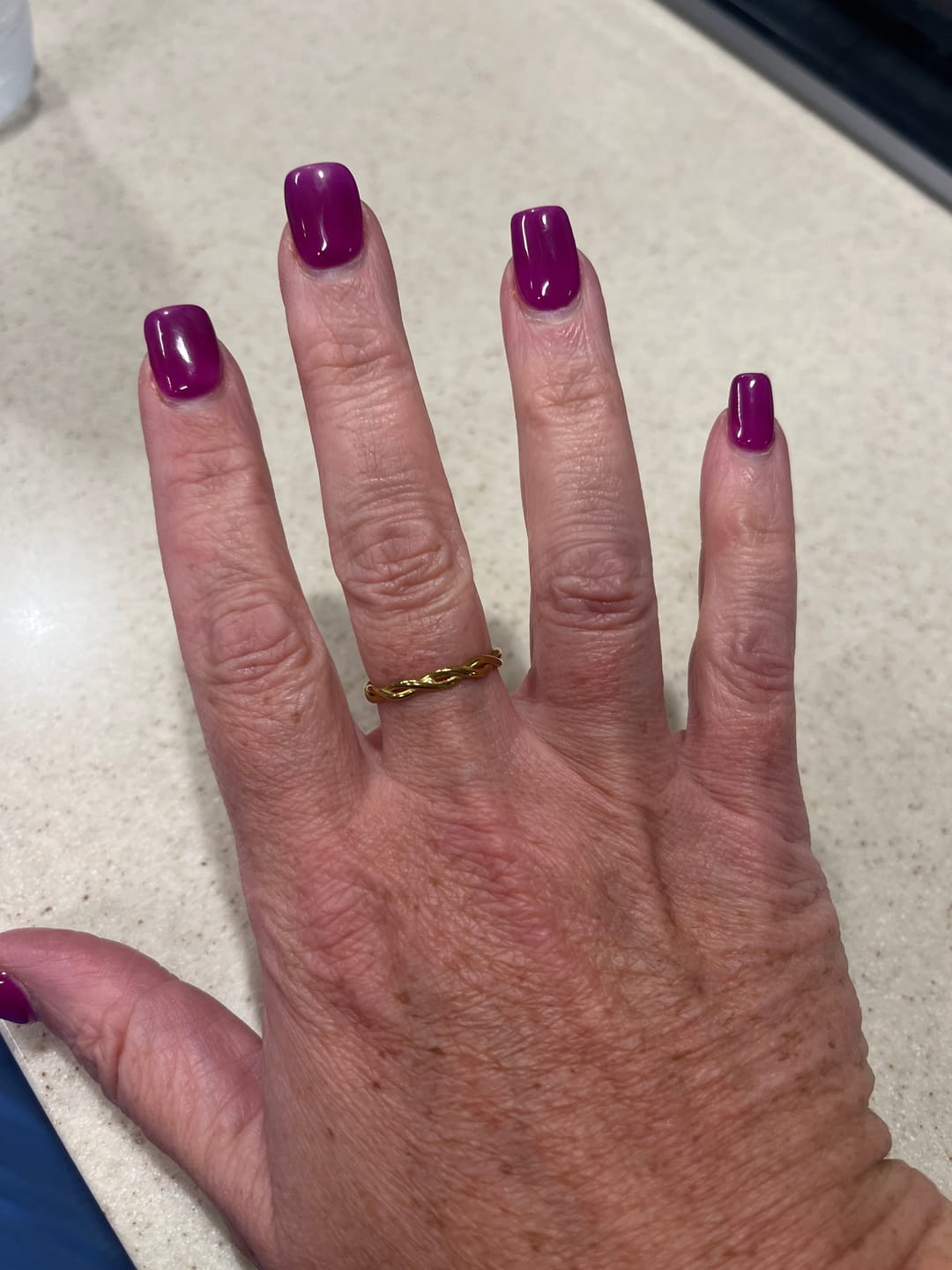 Customer photo review of Infinity 18K Gold Twist Ring