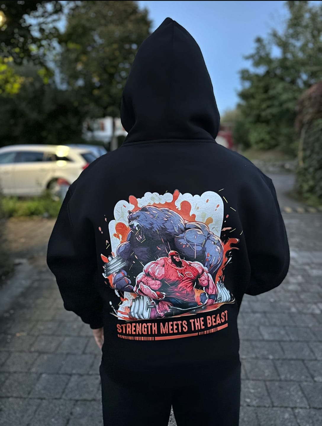 Customer photo review of STRENGHT MEETS THE BEAST Oversized Premium-Hoodie (Backprint)