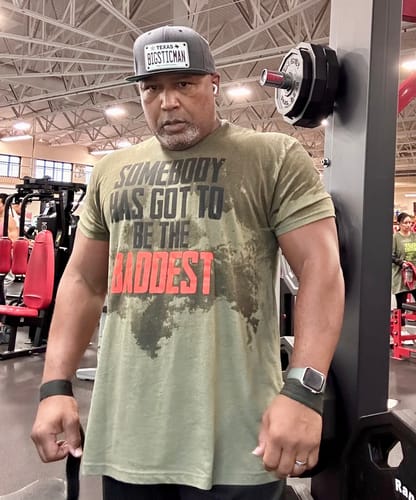 Customer photo review of Gym Apparel Brands | Iron Addicts "Somebody Has Got To Be The Baddest" Tee Shirt (Military Green)