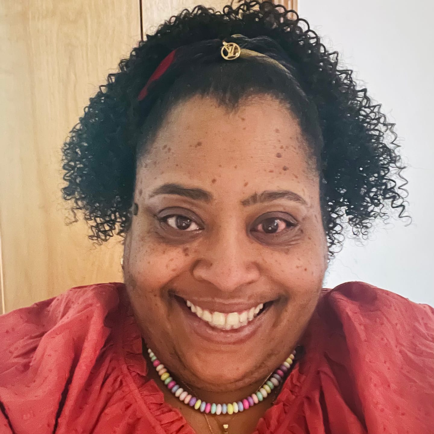 Customer photo review of Outre Big Beautiful Hair Drawstring Ponytail 4A KINKY KOILS 14"
