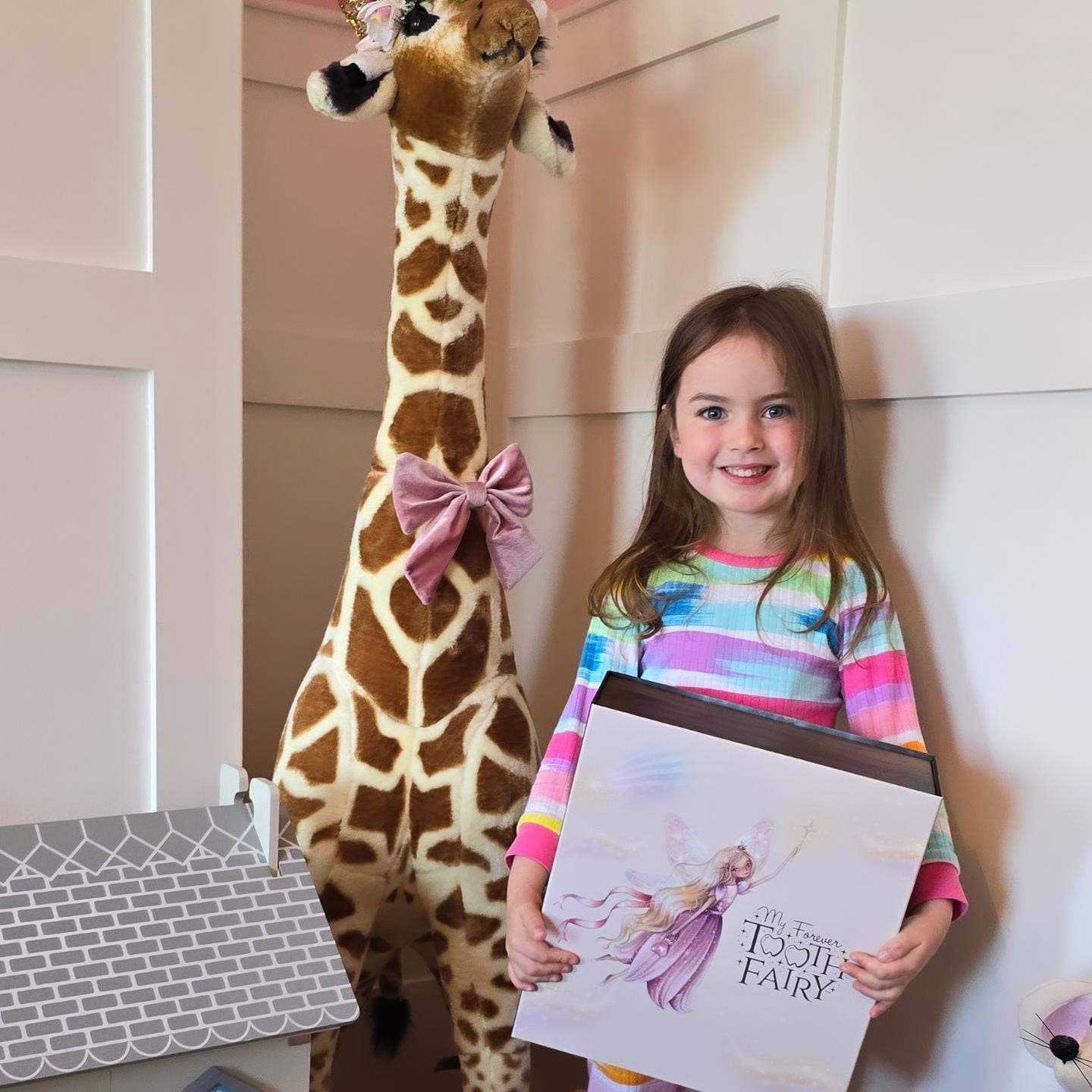 Customer photo review of My Forever Tooth Fairy Gift Set - Includes Storybook, Tooth Fairy Doll, Tooth Tote & Light Up Dis'Play' Case