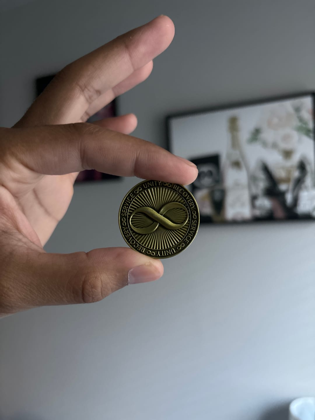 Customer photo review of Infinity Symbol AA/NA Bronze Recovery Medallion