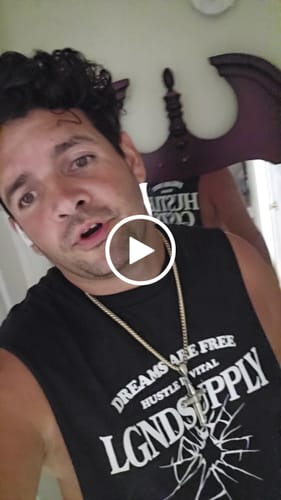 Customer video review of Hustle Costs Tee