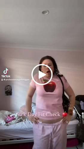 Customer video review of 'Rotten' premium baby tee