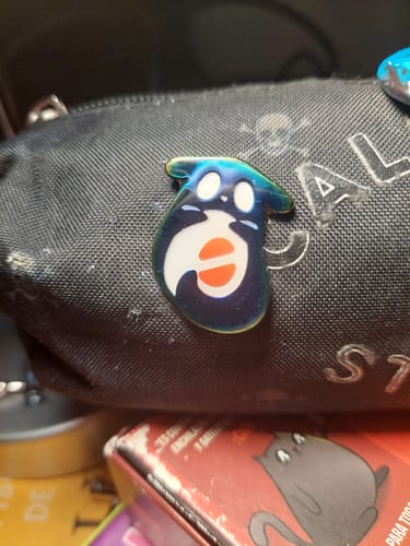 Customer photo review of Rain World - Inv Slugcat Pin