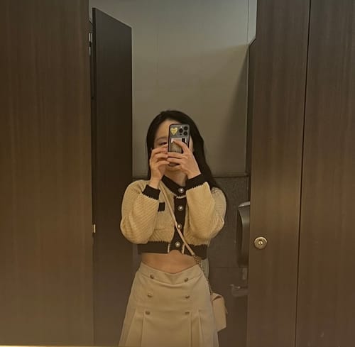 Customer photo review of Contrast Color Cropped Knitted Cardigan Leather Skirt