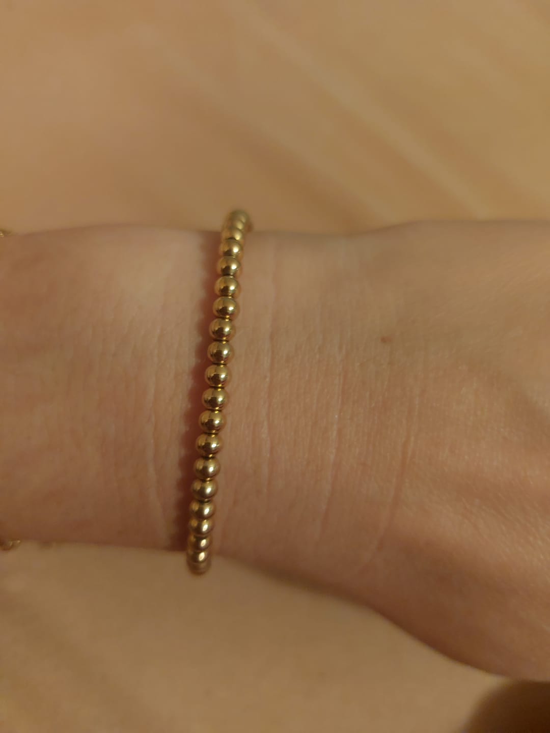 Customer photo review of Niloya Beaded Gold Bracelet