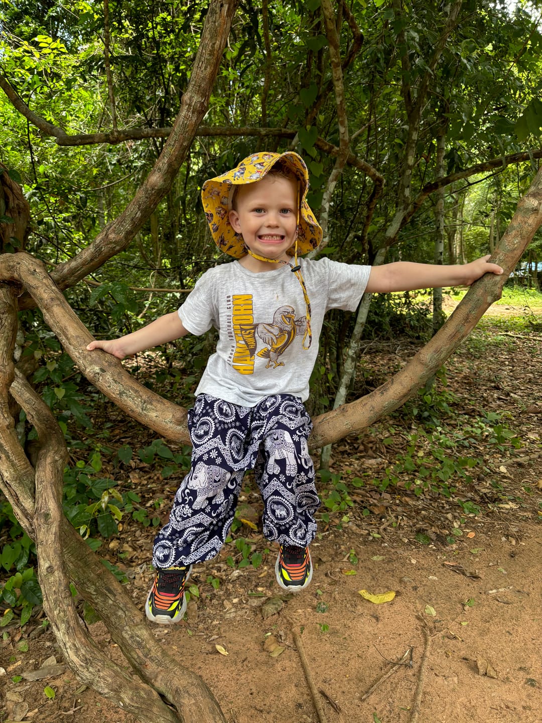 Customer photo review of PREORDER Fluro Dinosaurs Beach Hat (Ships w/c 17th June)