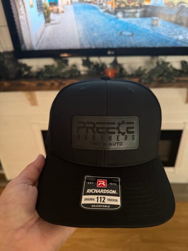 Customer photo review of Custom Leather Patch Trucker Hat - Richardson 112
